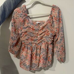 Floral ruched peplum top